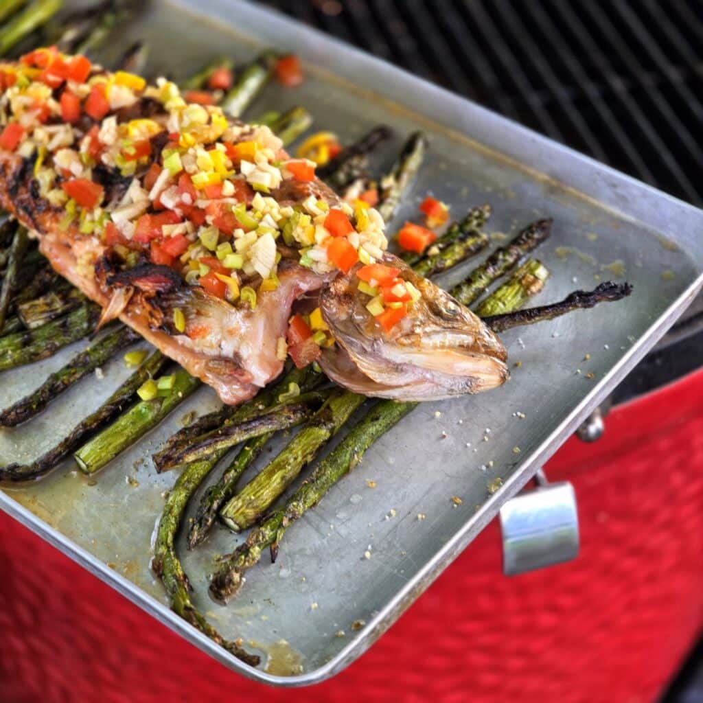 Grilled char on asparagus with Thai sauce